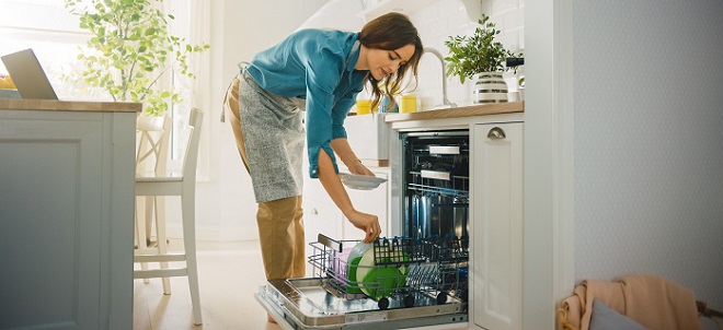 Image of homeowner checking dishes in the dishwasher