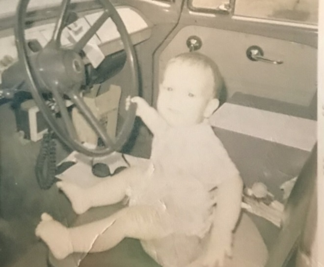 9-month old Kevin Kanta in his dad’s Sears truck