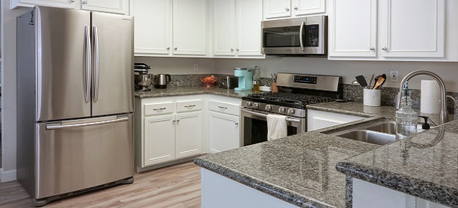 Image of kitchen with new stainless appliances
