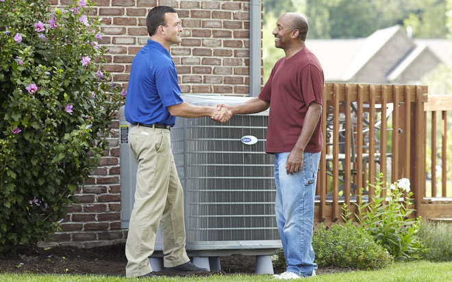 Image of Sears HVAC completing system maintenance