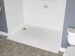 low-threshold shower base allows for easy step-in