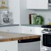 White and green kitchen with Kenmore appliances