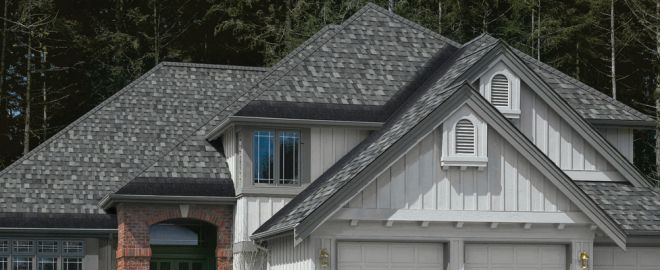 Roofing installation with dark and light gray roof shingles